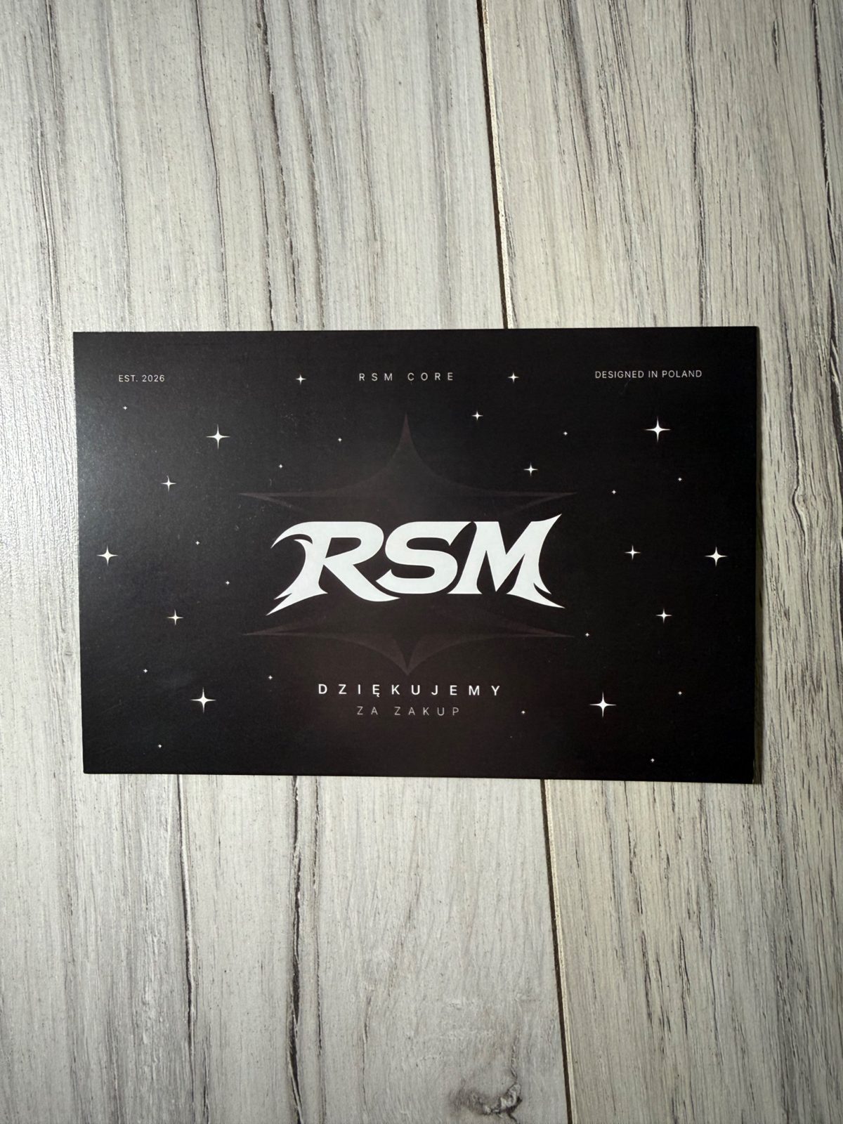 Czarna kartka Dziękujemy za zakup z logo RSM